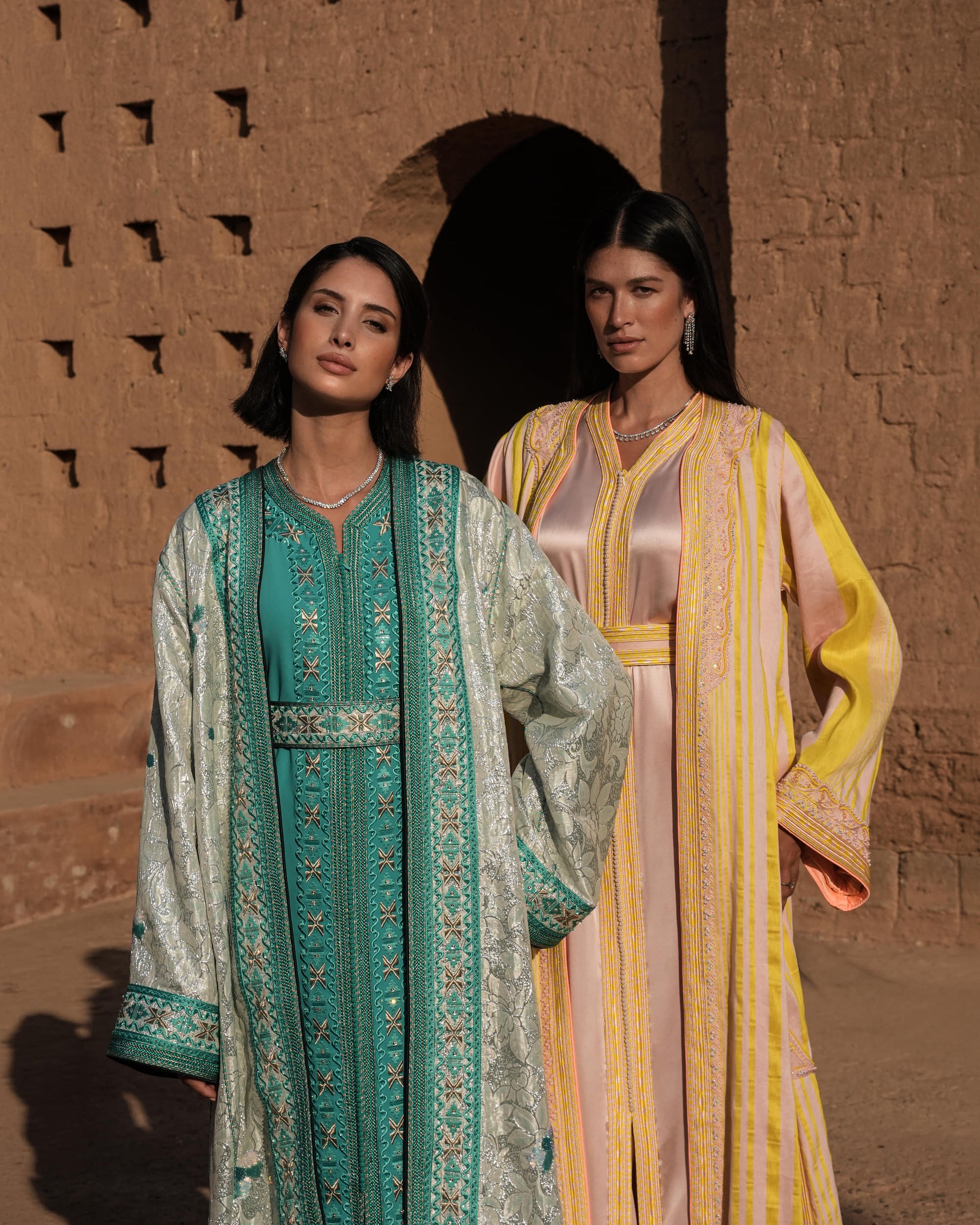 Azure Constellation turquoise Moroccan kaftan with star embroidery under an ivory brocade mansouria, shown alongside a second look