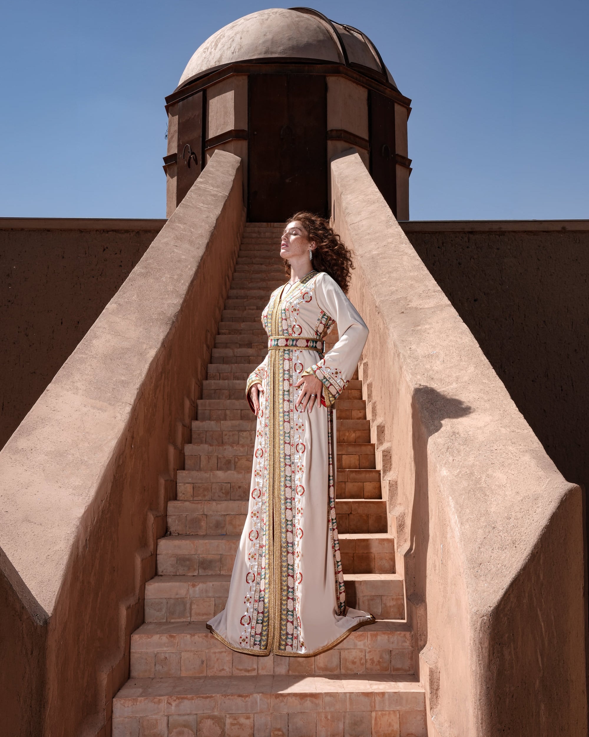 Ecru Tapestry ecru Moroccan kaftan with bands of polychrome beading, full-length view